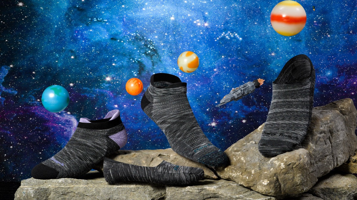 Four Darn Tough socks looking out of this world in gray space dye. Plus some planets