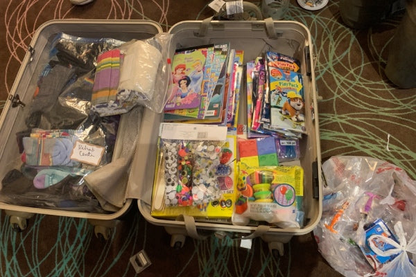 socks, crafts, coloring books, and other donations for Wisdom House