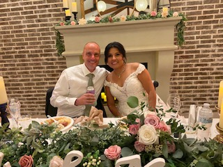 Matt and Elizabeth smiling on their wedding day