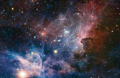 A broad panorama of the Carina Nebula, a region of massive star formation in the southern skies.