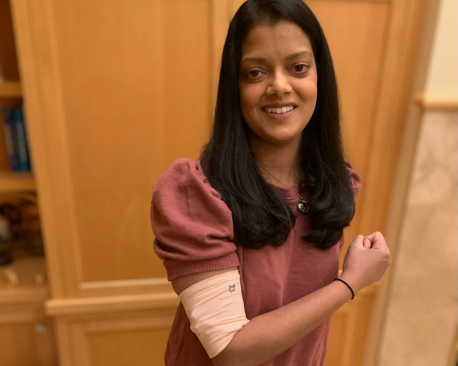 Swapna wears the PICCPerfect<sup>®</sup> PICC Line Cover in Blush by Mighty Well