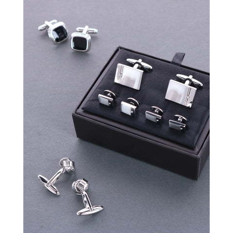 Men's jewelry items containing two cufflink sets and a formal set