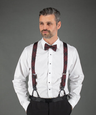 Man wearing suspenders and bow tie