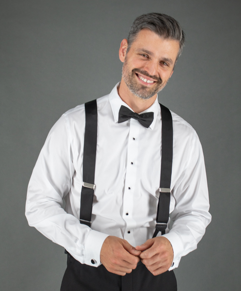 Man wearing a bow tie and suspenders