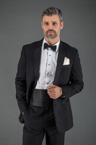 Man wearing a black-tie ensemble