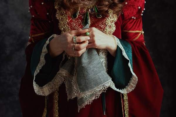 Renaissance Woman holding a fancy handkerchief