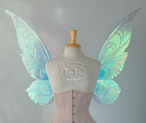 Trinket 26 Inch Iridescent Fairy Wings In Blue Tinted Satin White With Fancy Fairy Wings Things - chrome fairy wings roblox