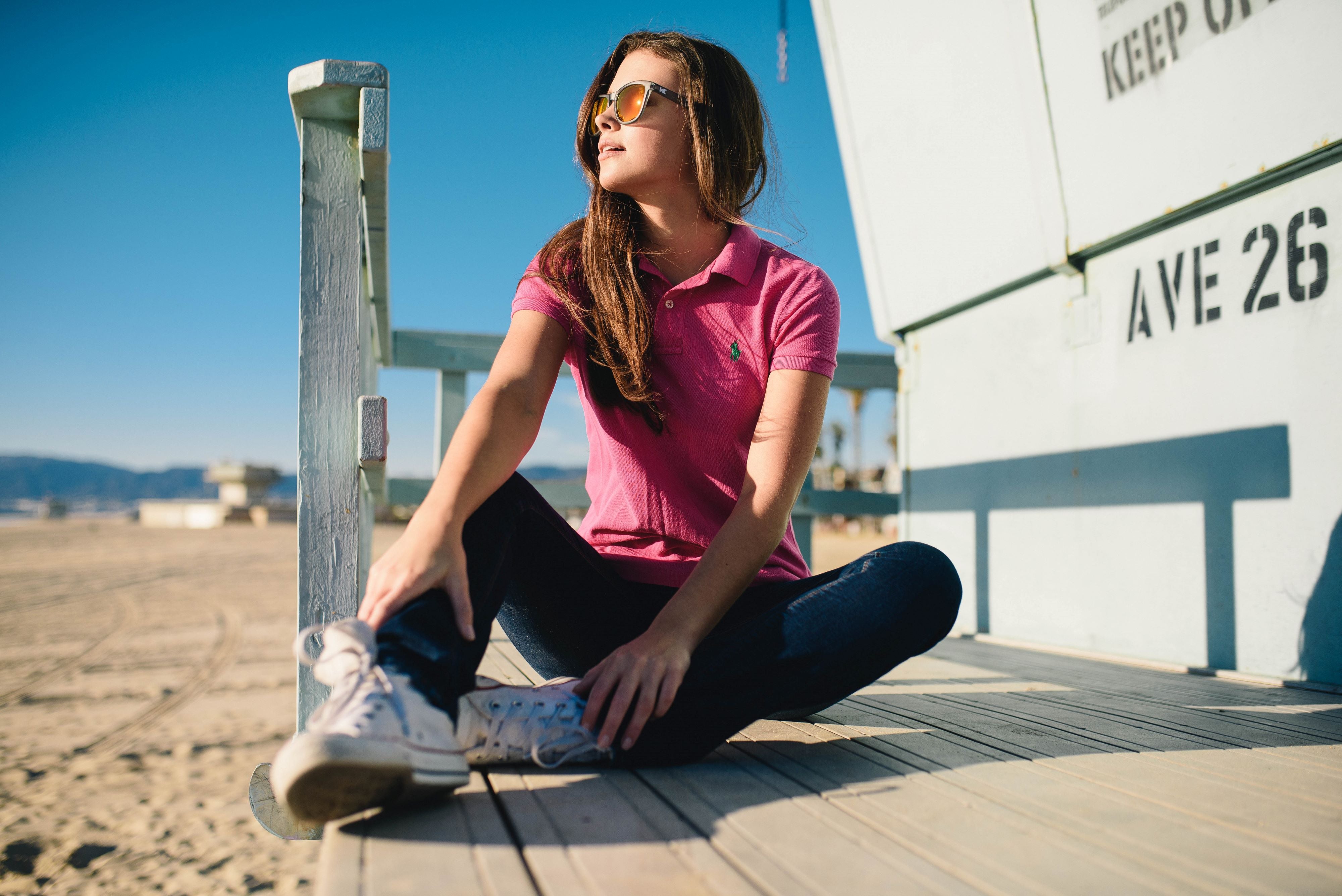 Woman wearing frosted  grey sunglasses