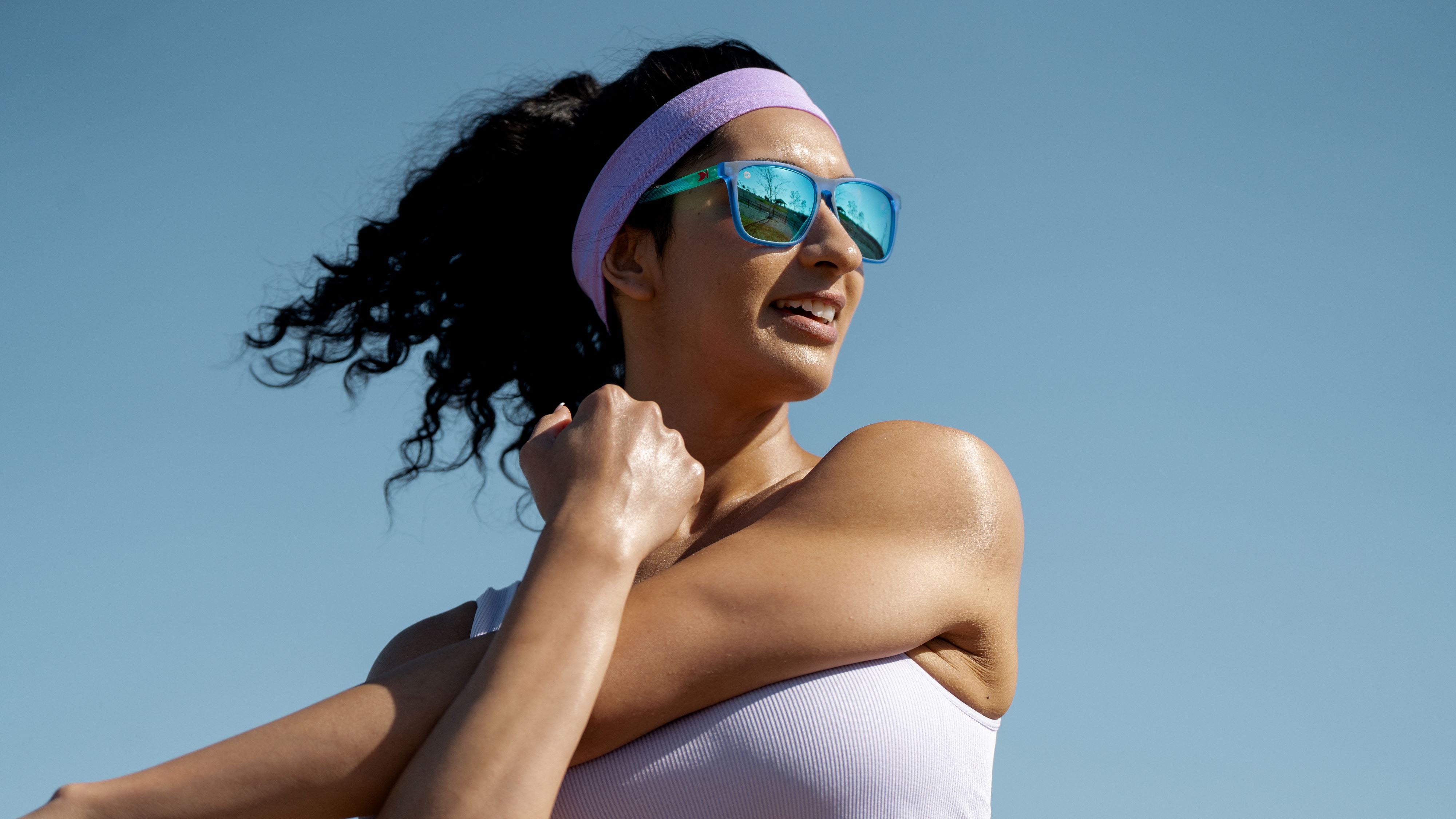 Woman wearing hill charge premium sport sunglasses