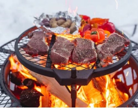 Selection of food items cooking over open flame