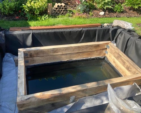 water feature being built from sleepers