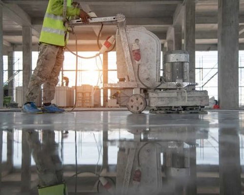 Man polishing concrete floor