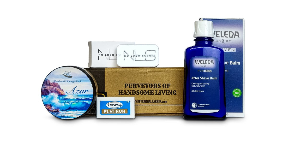 Recurring Discovery Box featuring azur shaving soap, savage solid cologne, Weleda after shave balm, and Personna replacement razors on a white background