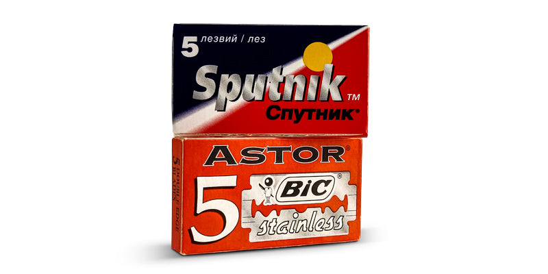 Sputnik and BIC Astor replacement DE razor-blade packs on white background