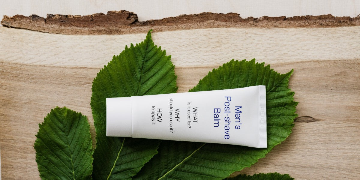 white skin cream tube on a leaf on a block of wood with caption: "Men's post-shave balm: What, Why, How"