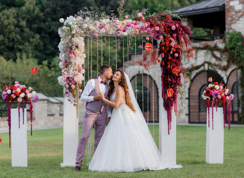 wedding-archway-backyard-happy-wedding-couple-outdoors-before-wedding-ceremony.jpg__PID:5c8b576d-b2d1-4f35-8d8a-ff0ea2706976