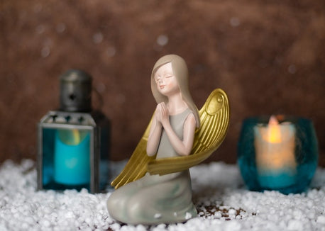 Christmas angel figurine made of sandstoe material.