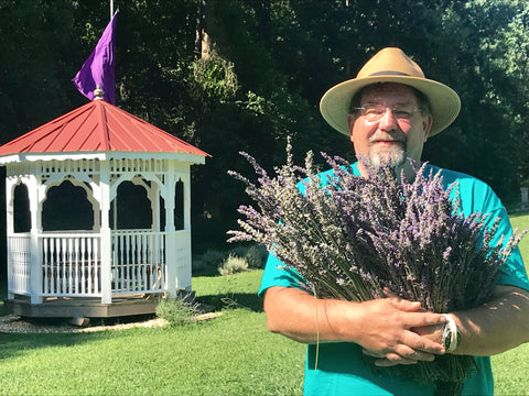 man holding lavender