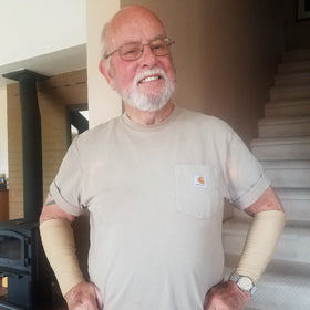 man wearing skin guards forearm protection