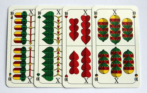 An array of four cards, the 10 of acorns, 10 of leaves, 10 of hearts and 10 of balls (almost like sherical Christmas tree ornaments.)