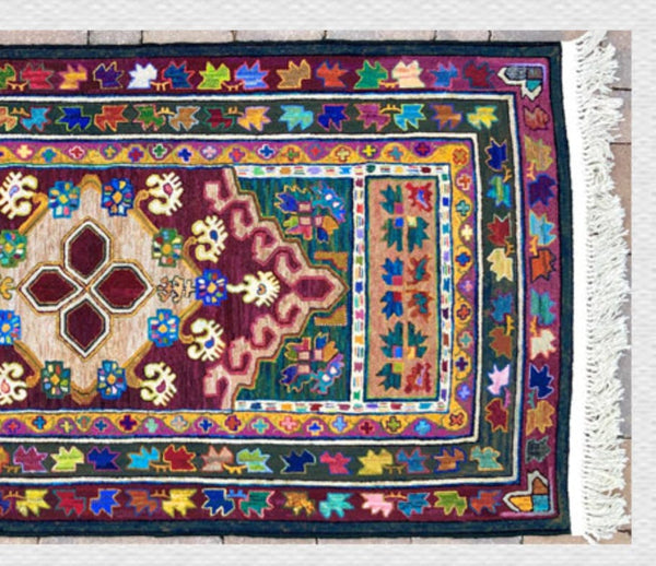 This type of pattern with angular shapes is called an "Oriental" Pattern among rug hookers. This rug is designed and hooked by Sandra Brown of Ohio.​