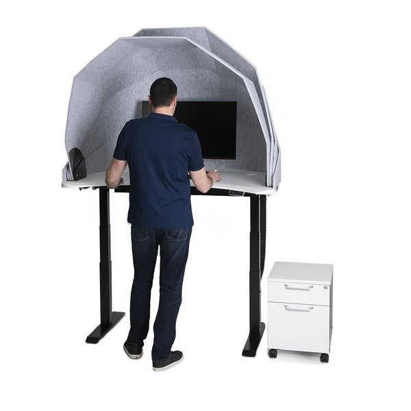 MojoDome man standing in front of standing desk pod
