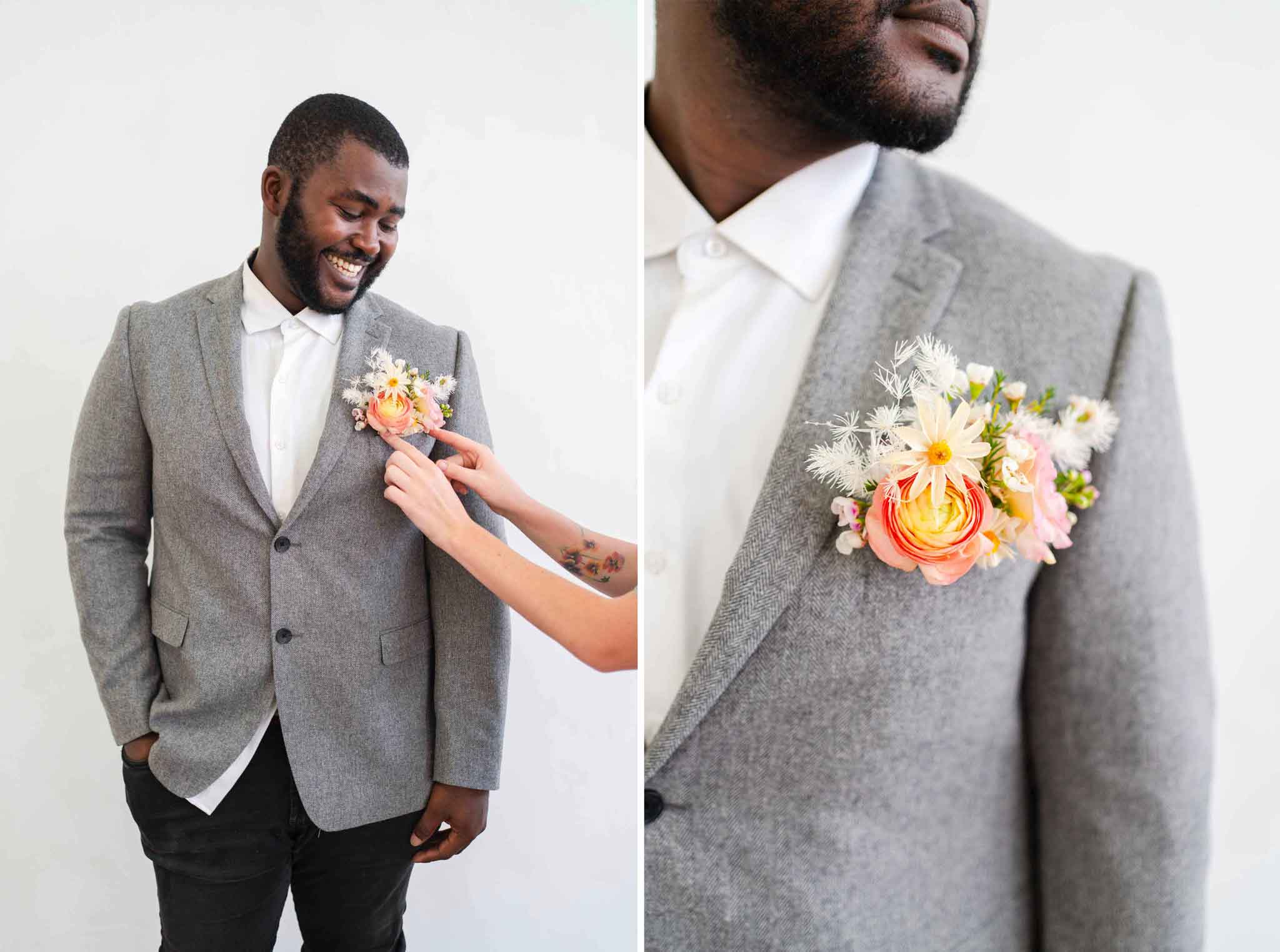 A man wearing a floral Pocket Boutonnière inside the jacket pocket of a gray suit