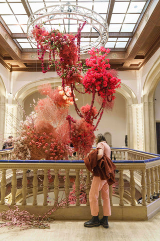 Natalie Gill admiring the Rotunda Art Installation at the San Diego Museum of Art