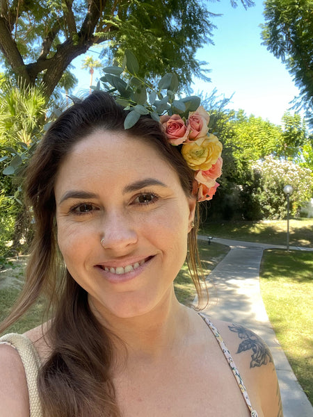 Woman wearing a flower crown outdoors
