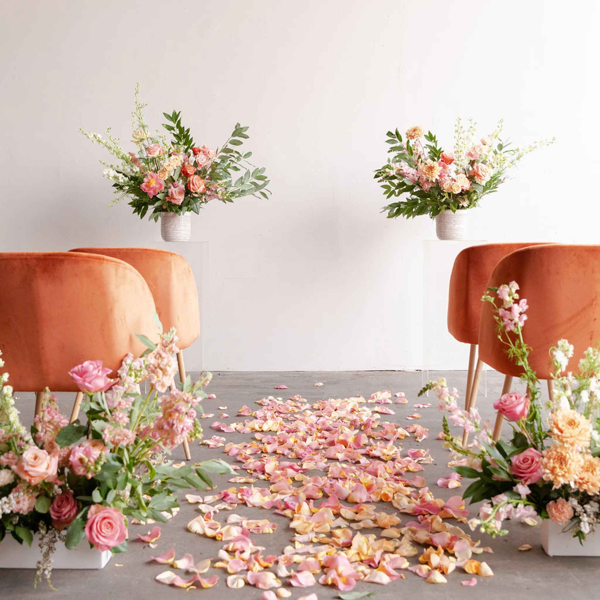 Ground Aisle Marker with petals and a ceremony setting