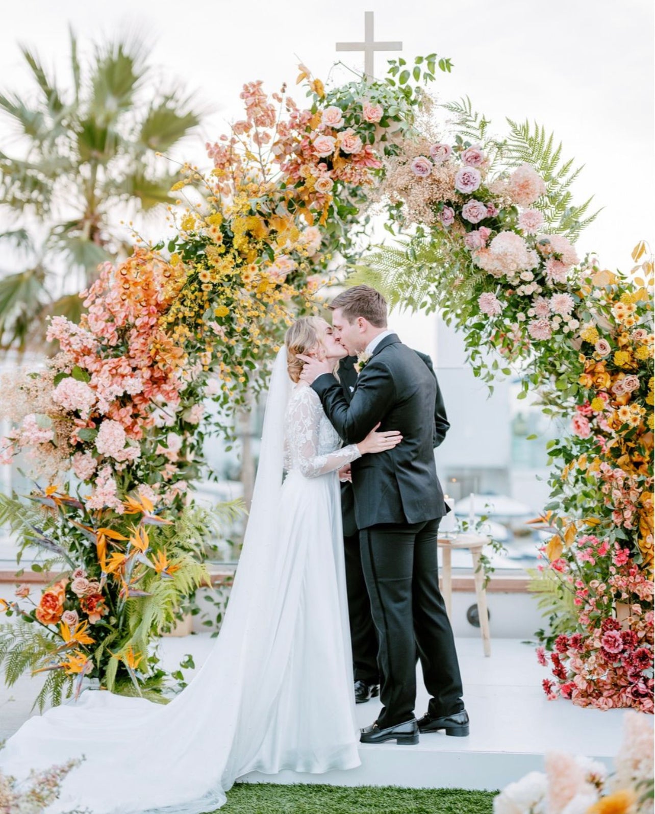 Ombre tropical floral arch.