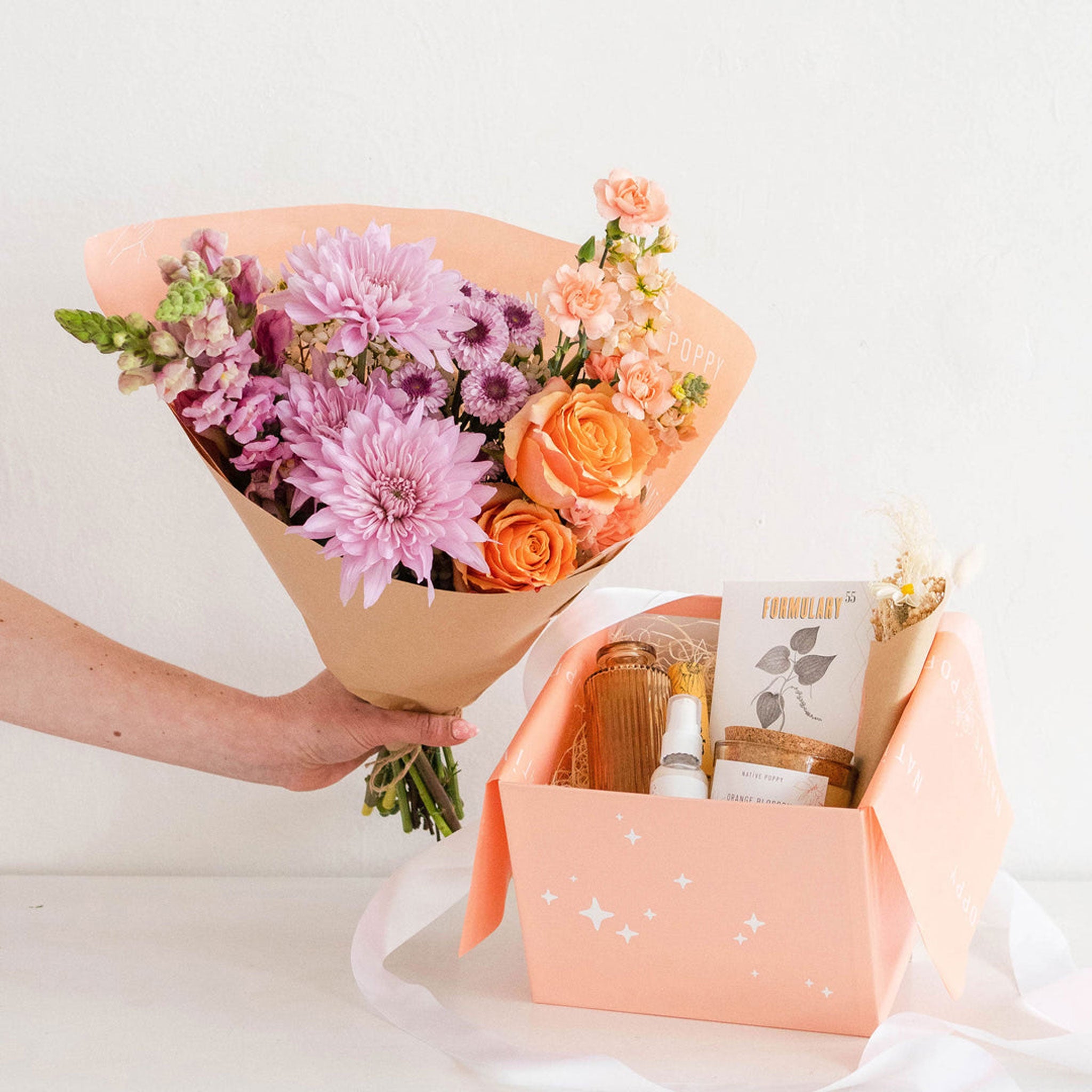 Mother's Day gift box and fresh flower bouquet