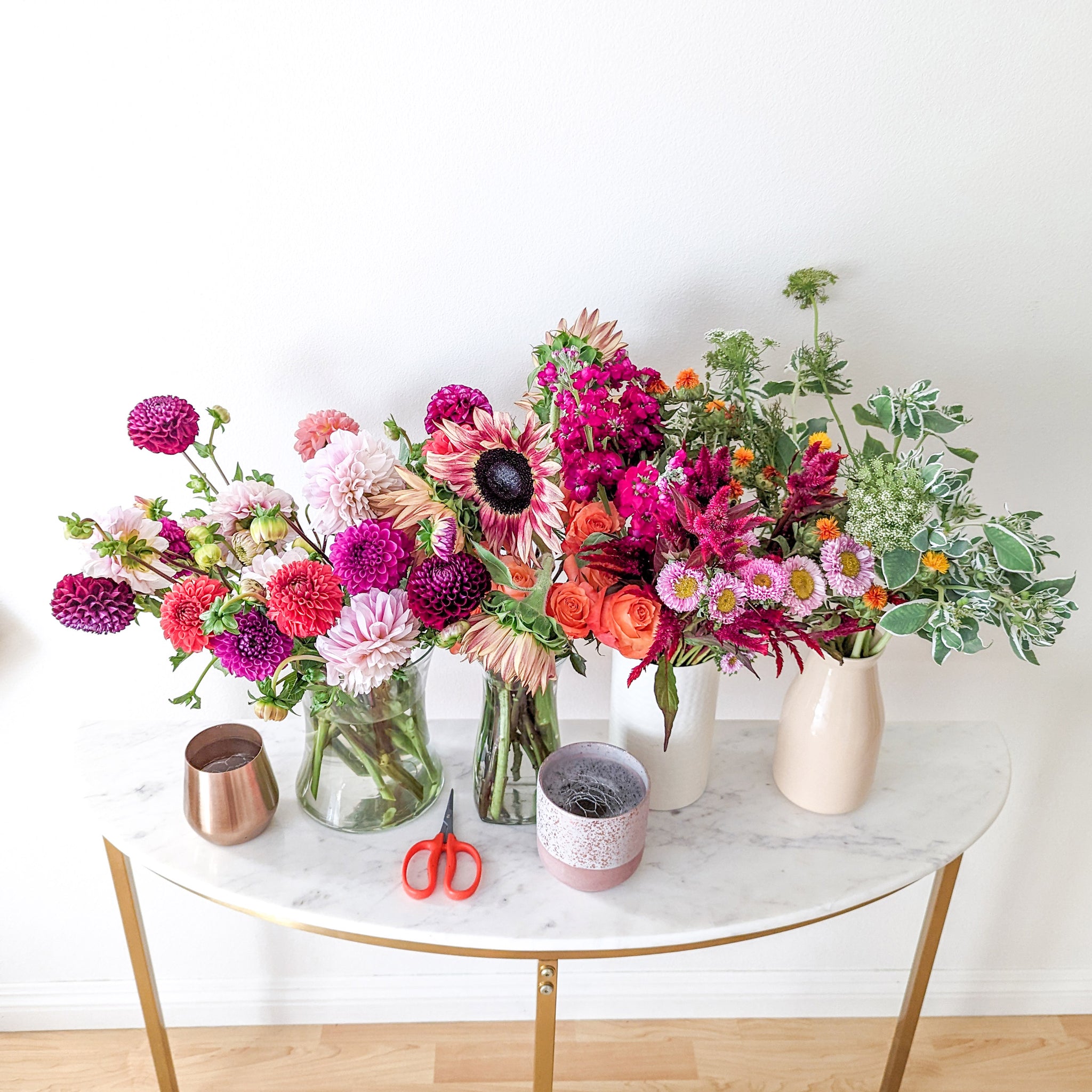 Fresh flowers in vases - flower class student work