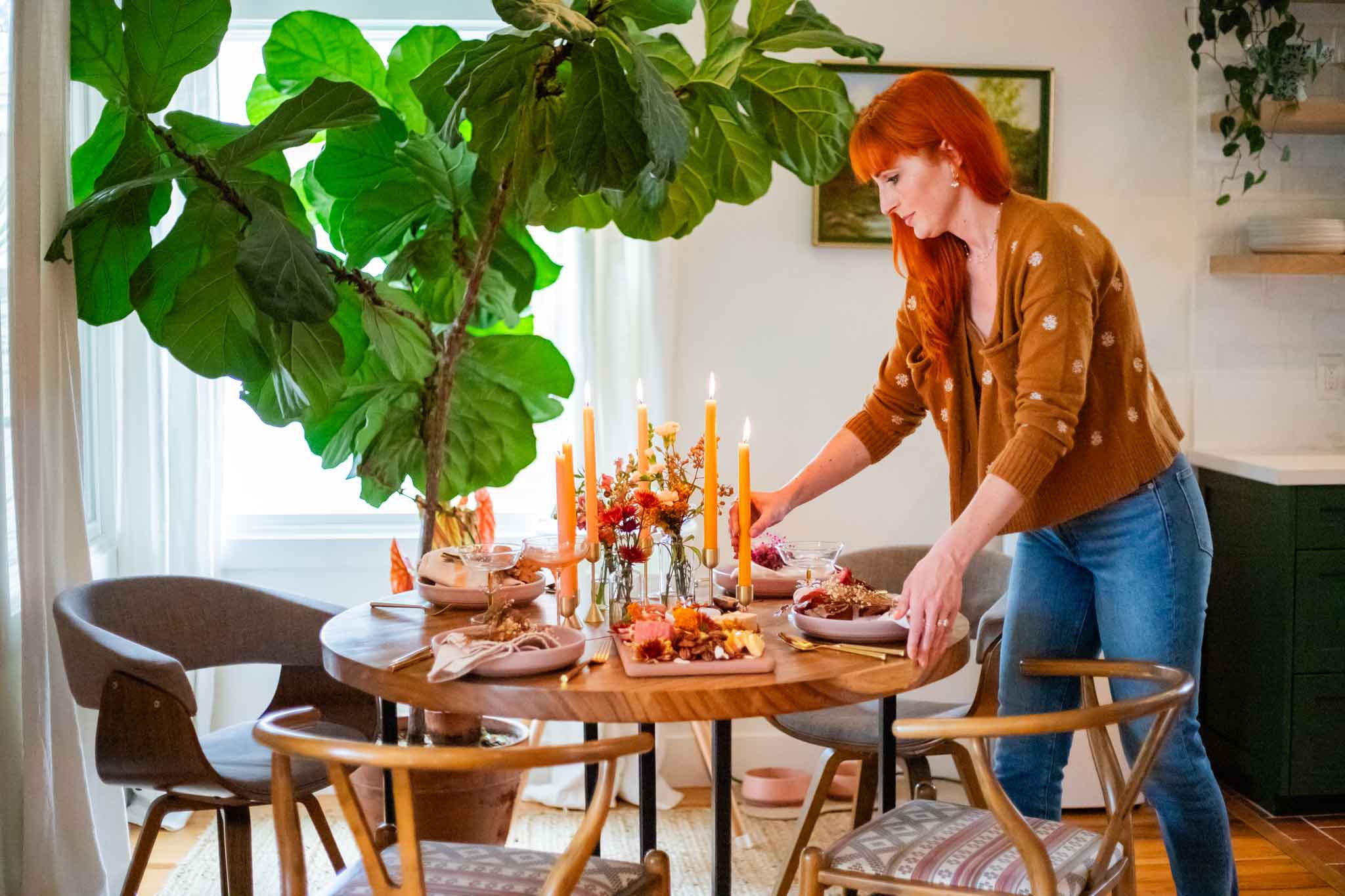 Florist arranging flowers on a Thanksgiving table