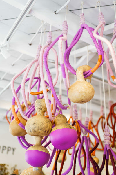 Painted gourds and colorful rope