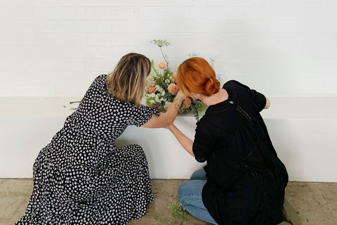 Florists arrange funeral flowers
