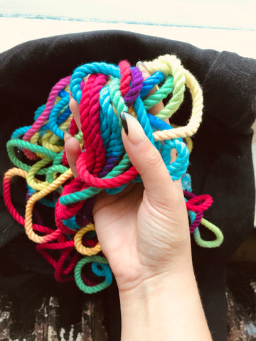  Hand holding Emoibator Funfetti Rope