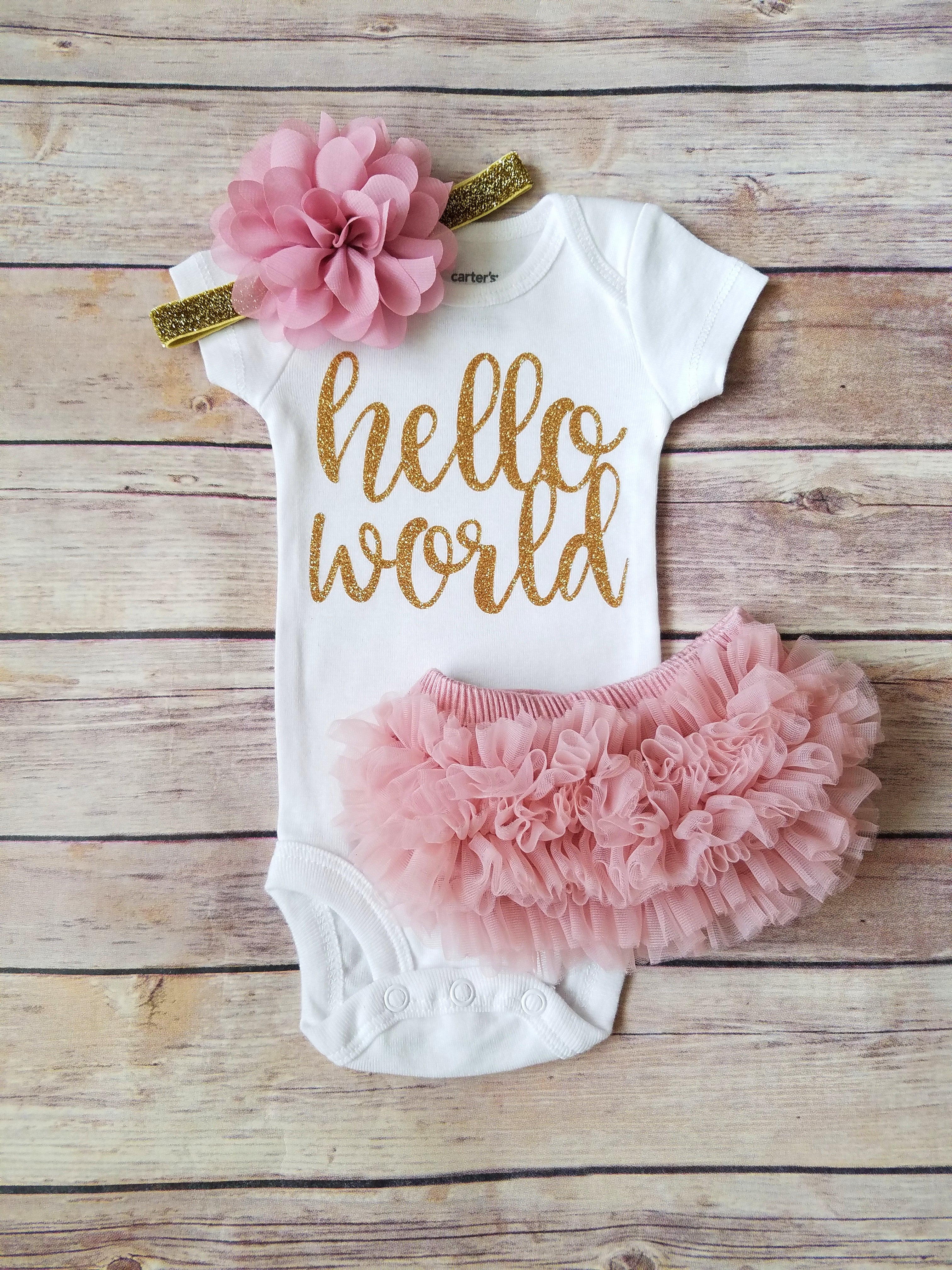 pink and gold baby outfit