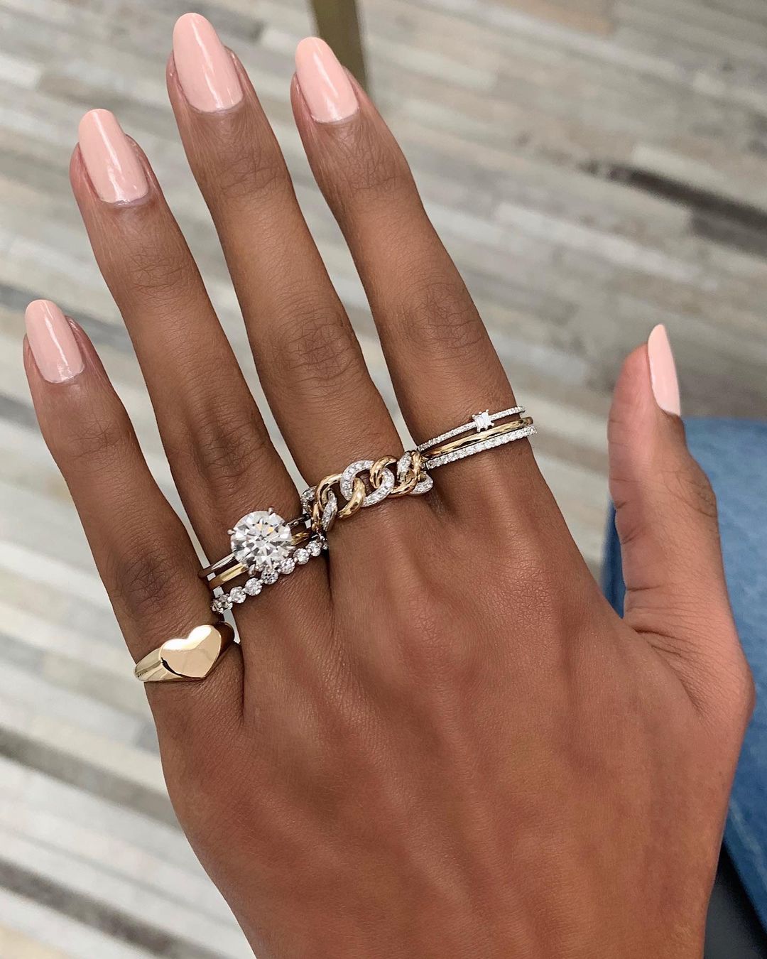 mixed metal wedding band and engagement ring stack