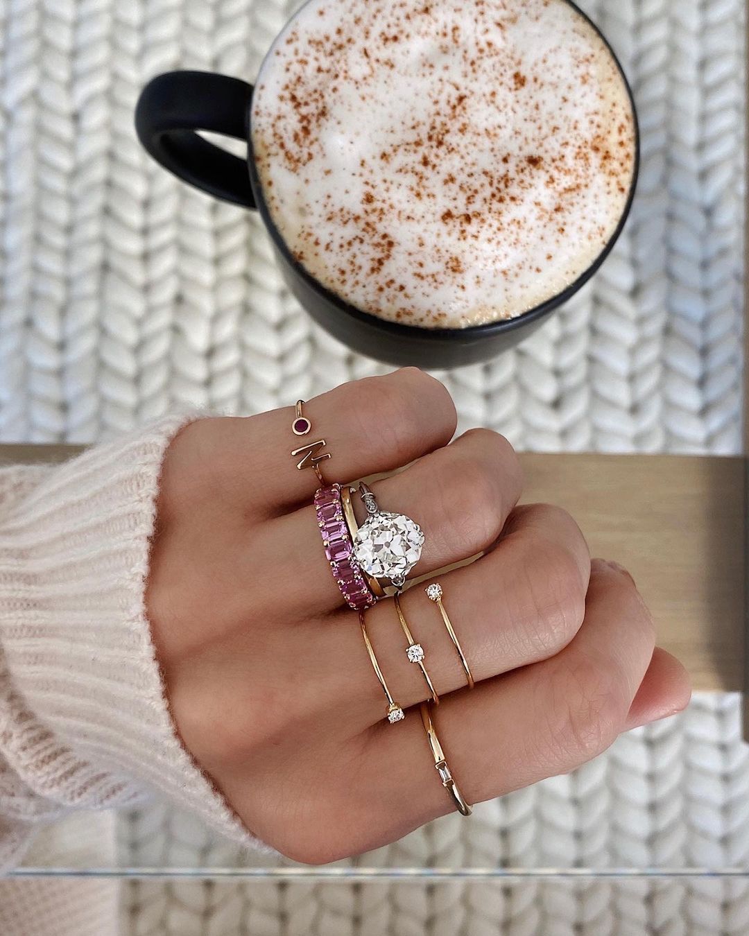 pink wedding band stack with engagement ring