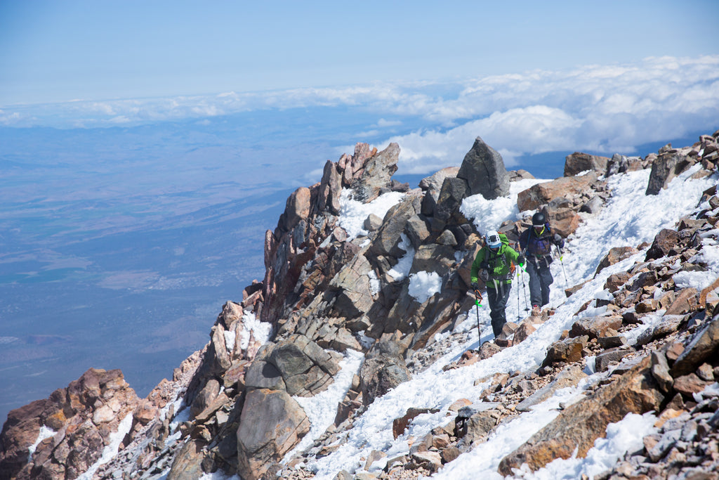 Ring of Fire Group on top of snowy mountain.