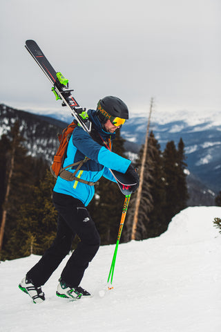 Al bootpacking up Berthoud with his skis on his shoulder