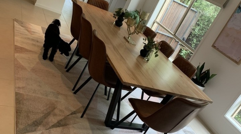 Rectangle large rug under an 8 seater dining table