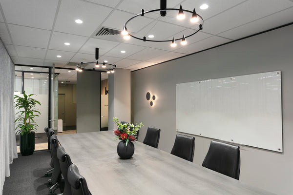Harmac Homes head office uses decorative pendants supplemented by wall lamps and downlights