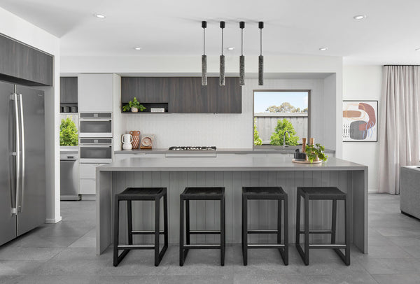 Boutique Homes volume builder Seville display home kitchen dining room with Lumi Lighting Luxor pendant lamps.