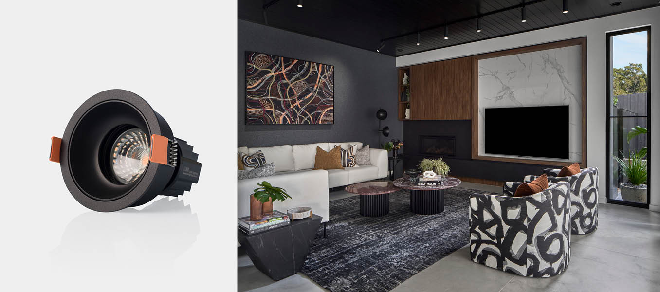 Timbre Dim to Warm downlight, living room with dark walls, ceilings and furniture.