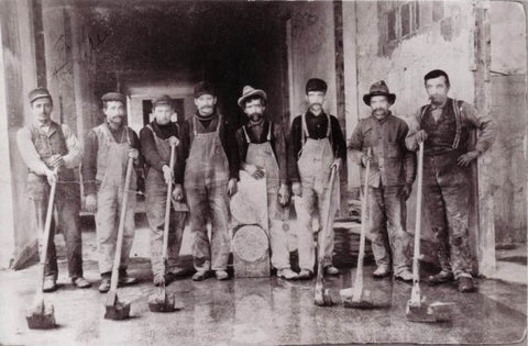 A historic photo of terrazzo grinders and finishers prior to the 1920s, courtesy Venice Art Terrazzo Company.