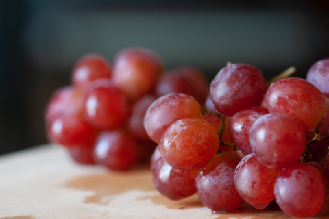 Fresh purple grapes on a table 