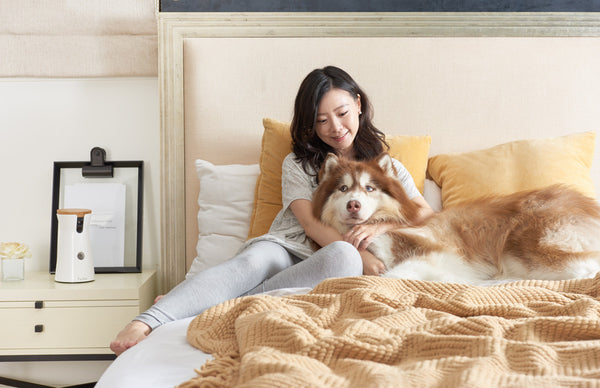 Woman hugging Husky 