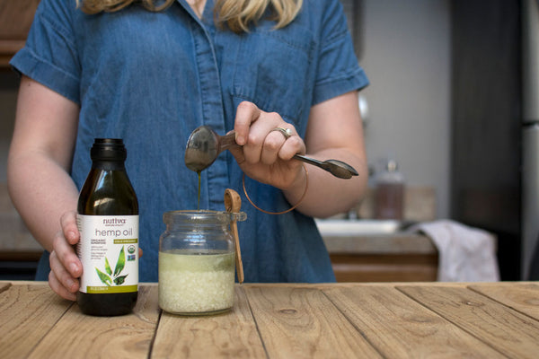 Pouring oil inside the jar